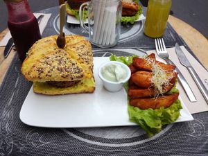 Burger and fries at Sweet Rawmance in Paris