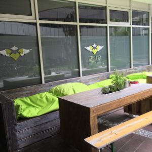 outside at Rebella Bex Cafe in Munich