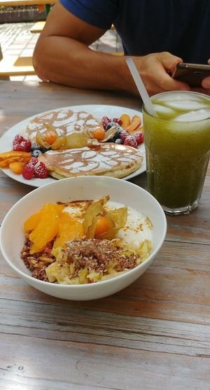 pancakes & granola bowl at Rebella Bex Cafe in Munich