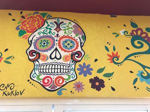 Awesome artwork on the walls by local artists, everything is locally sourced. at Coz Coffee Roasting Co. in Cozumel