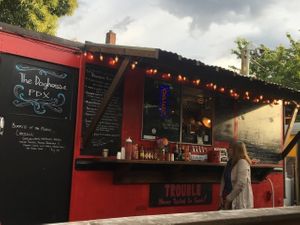 Food truck front and menu at The Doghouse PDX - Food Truck in Portland