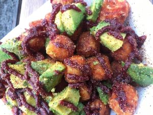 Sweet potatoe tot bowl, Korean sauce, sesame oil, avocado, seasoning at The Doghouse PDX - Food Truck in Portland