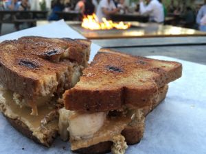 Grilled nut butter, apple jam and banana sandwich on cinnamon raisin toast at PBJ Grilled - Food Truck in Portland