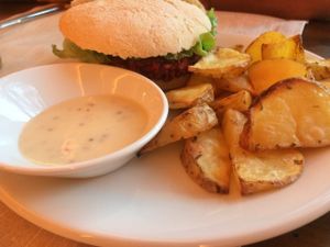 Burger and oven fries (the fries were the best part!) You can ask for the small or big burger plate so make sure to ask. at Level Veggie Bistro in Madrid