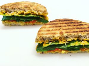 Gluten-free panini with housemade vegan queso,sweet picante peppers and organic spinach  at The Juice Place in Charlottesville