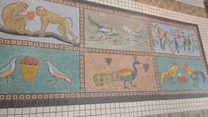 Inside seating area adorned by a beautiful mosaic at The Juice Place in Charlottesville