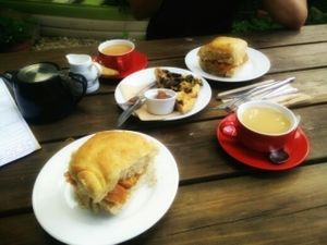 Our all Vegan brunch consisting of veggie sausage sandwich, mushroom flatbread and Chai tea with soy milk at White's Bakehouse in Bridlington