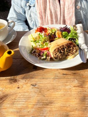 Mushroom roll with salad (all vegan) and camomile tea.   at White's Bakehouse in Bridlington
