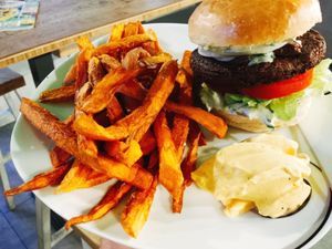 Tasty vegan Tzatziki-Burger with sweet potato fries and vegan, homemade Mayo at Veggieman Xpress in Nuremberg