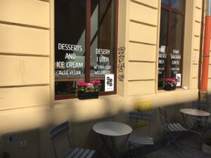 Windows with vegan signs  at Mo-Ja Cafe in Krakow