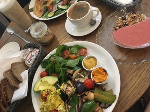 Vege brunch (vegan) and spinach and mushroom omelette in the background (not vegan)  at Mo-Ja Cafe in Krakow