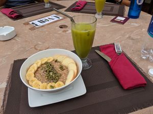 Porridge and Hue smoothie at Capture Vietnam in Phong Nha