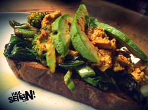 Scrambled Tofu on Toast w/ Avocado, spinach, garlic tahini & truffle oil at Hail Seitan in Brighton
