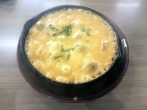 Bubbling cheesy potatoes at Vegan Inc - Miyana in Mexico City