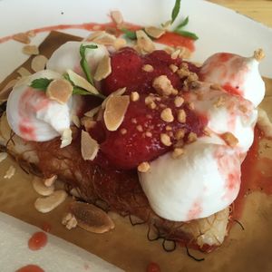 Knaffe with vanilla cream, strawberries and almonds  at Umm Kulthum in Haifa