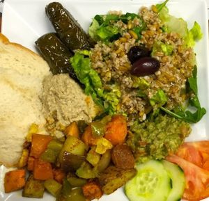 The Earth Plate features stuffed vine leaves, Baba Ganoush, Hummus, roasted veggies, guacamole
 and toasted flat bread along with fresh veggies. All items are house made.  at Guernsey Kitchen in Cambridge