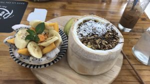 Coconut granola smoothie bowl. Served with fruit and coconut water. at Royal Sai Gon  in Ho Chi Minh City