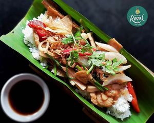 Sautéed Mushrooms and Veggies with white rice on bamboo tube. at Royal Sai Gon  in Ho Chi Minh City