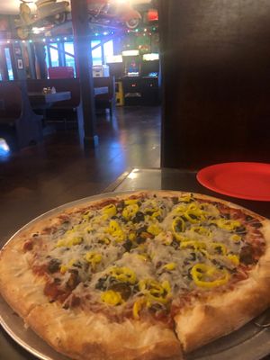 New York style with vegan cheese, tempeh, black olives, and banana peppers. at Cappy's Pizzeria - Seminole Heights in Tampa