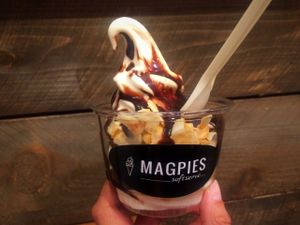 Vegan sweet corn softserve sundae with chocolate sauce and crispy coconut flake  at Magpies Softserve in Los Angeles