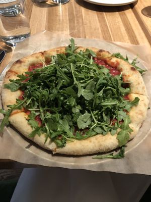 Arugula tomato pizza at True Food Kitchen - W Ave in Austin