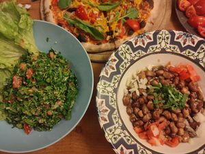 Tabule salad, beans with vegetables and oil, pizza at Rokka in Antalya