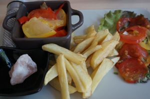 French fries with baked summer vegetables at Green Rainbow in Paris