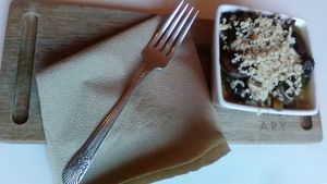 Beans and Greens entree at Commissary! New Paltz. Grated vegan cheese garnishes top. Fava (broad) Beans and, cooked green and leafy veggies. August 2021. . at Lagusta's Luscious Cafe in New Paltz