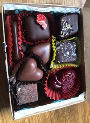 Assorted chocolates: strawberry balsamic caramel, tahini meltaway, milk chocolate heart, bleeding heart, ancho cinnamon, and yuzu cashew cream. at Lagusta's Luscious Cafe in New Paltz