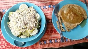 vegan yogurt, fresh fruit, muesli, vegan pancake. at Bodhi Tree Cafe in Chiang Mai