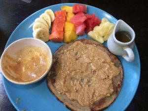Vegan pancake with homemade peanut butter and fruit.  at Bodhi Tree Cafe in Chiang Mai