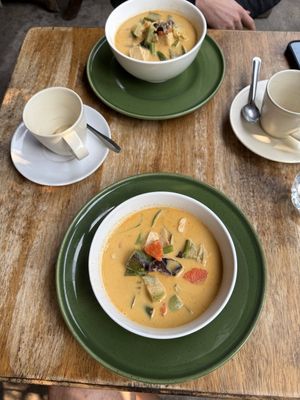 Our breakfast — two curries, two coffees  at Bodhi Tree Cafe in Chiang Mai