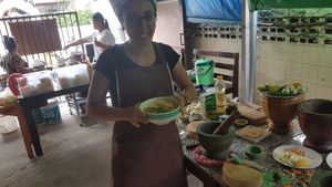 Proudly presenting the khao soi with no chilli! at Bodhi Tree Cafe in Chiang Mai