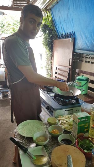Stirring some herbs and spices at Bodhi Tree Cafe in Chiang Mai