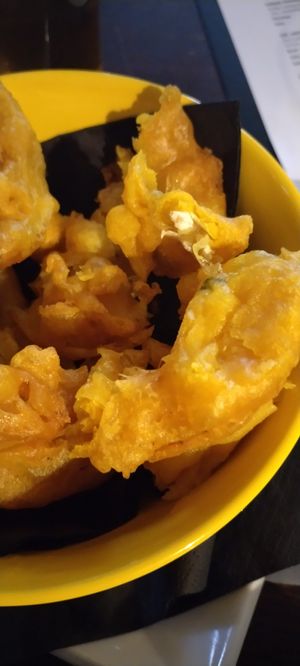 Clumps of flour and miscellaneous black bits in the onion rings at The Angel Microbrewery in Nottingham