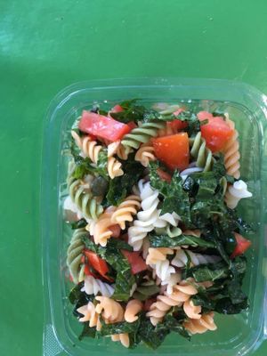 gluten free pasta with kale, craisins and pumpkin seeds at Natural Choice Cafe in Jerusalem