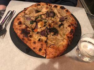 Pizza Nero: shiitake sauce, mushrooms, caramellized red onion and more. at Mediamatic ETEN in Amsterdam