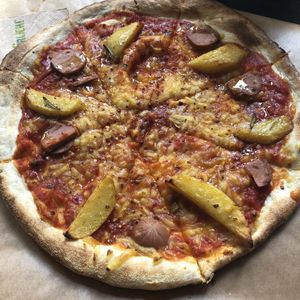 Potato and sausage pizza  at Pizzare in Berlin