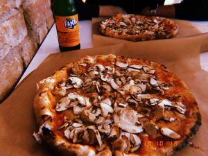 Mushroom and sausage pizza  at Pizzare in Berlin