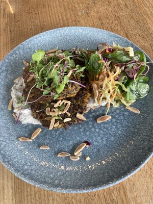 Quinoa Pattie’s with coconut yoghurt, side salad. Way better than can be put into words.  at Dux Dine in Christchurch
