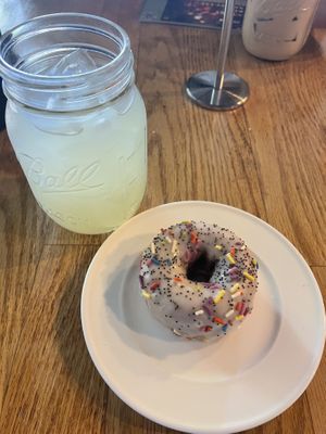 Vegan Lemon glazed blueberry donut and lemonade   at The Corner Beet in Denver