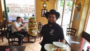 The owner. at Cowboy Burger Restaurant in Landau