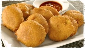 Pakoda - Potatoes savory coated with gram flour and deep fried. A new replacement to french fries.  at Atithi in Delft