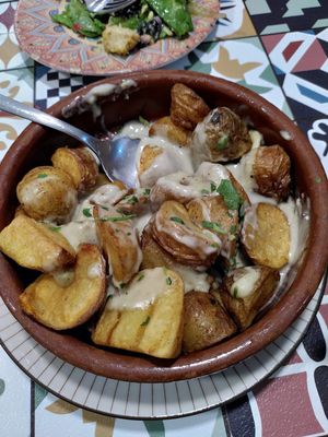 Patatas al cabrales at Distrito Vegano in Madrid