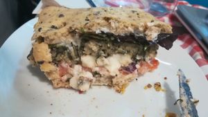 Greek burger (half way, amazing cheese, you won't even know it's vegan)  at Distrito Vegano in Madrid