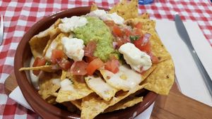 Fully loaded nachos at Distrito Vegano in Madrid