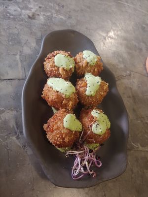 Italian Croquettes with basil on top at La Encomienda in Madrid
