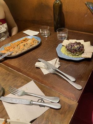 african rice (L) + tofu & tuna tartar (R), both delicious at La Encomienda in Madrid