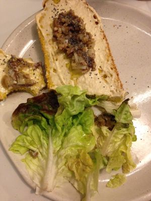 Hummus on Toast with Olive Garnish at La Encomienda in Madrid