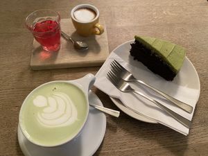 Matcha latte, machiato with a cold brew tea of the day and avocado chocolate cake 🍰 Yummy! #Veganuary at Waterloo Tea in Cardiff
